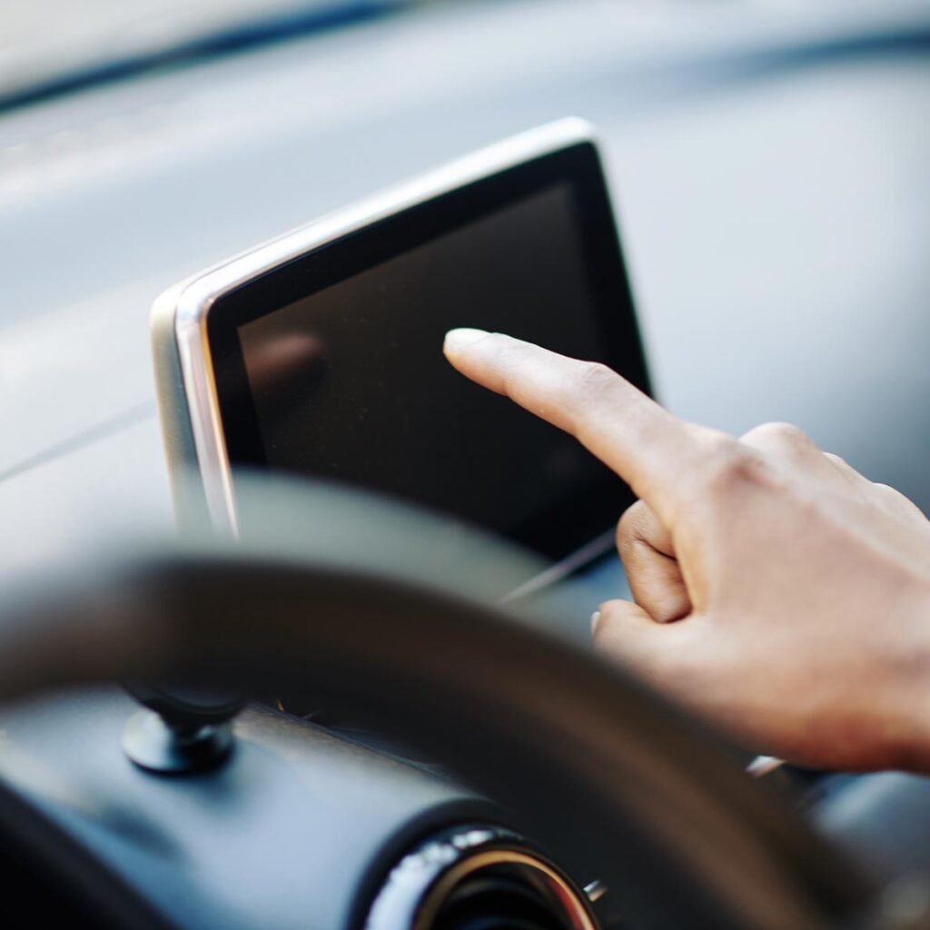 woman using app in her car 9utp92c.jpg