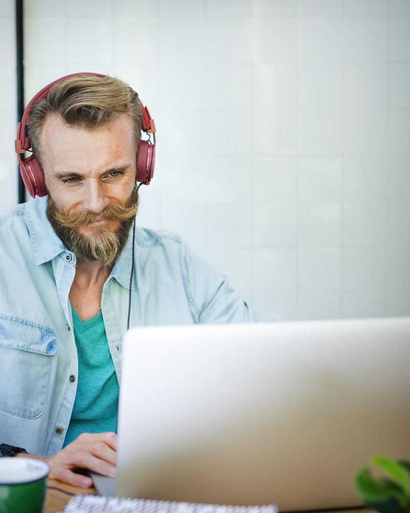 man laptop music streaming relaxation technology c pnbq7qb.jpg